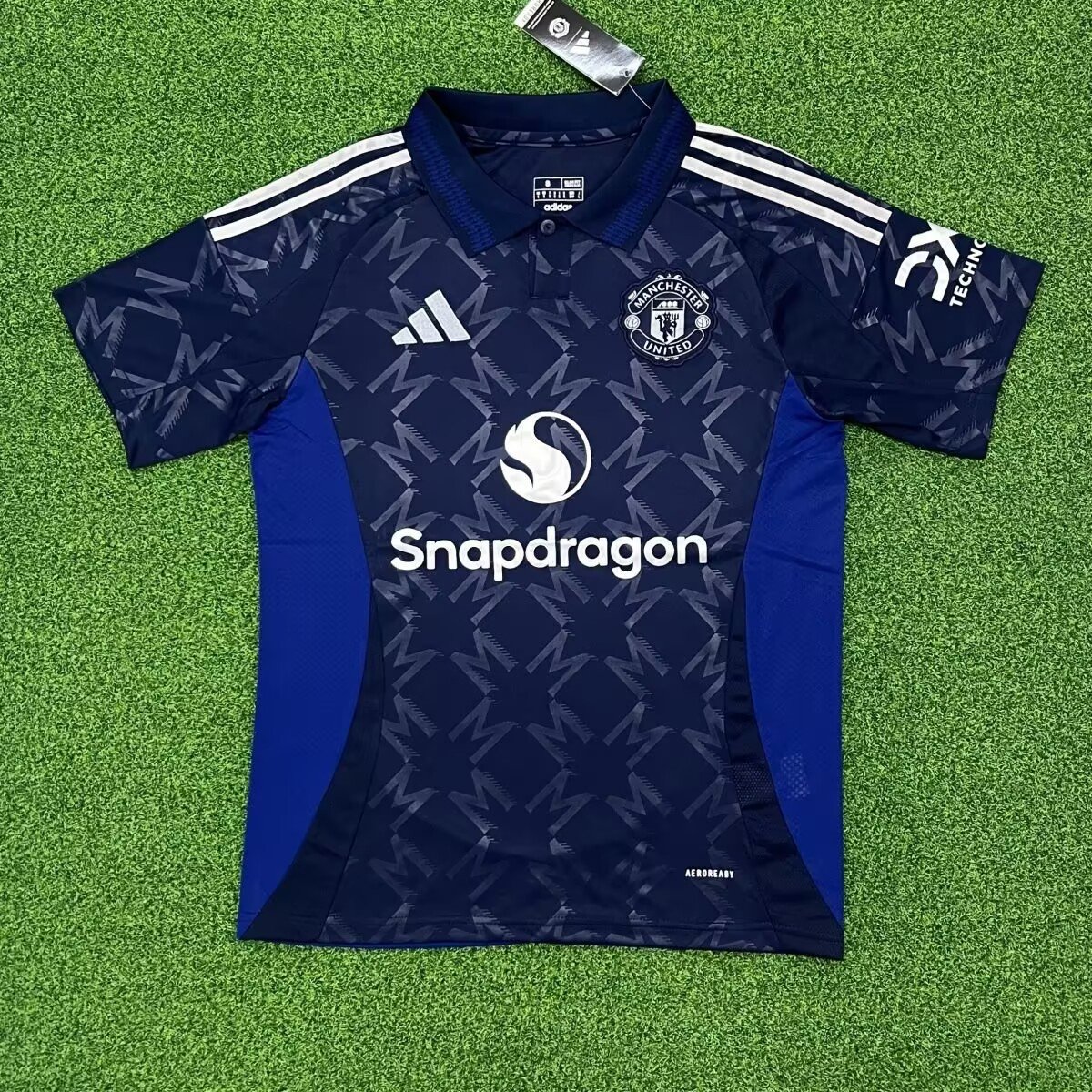 Version supporters 24/25 Manchester United extérieur